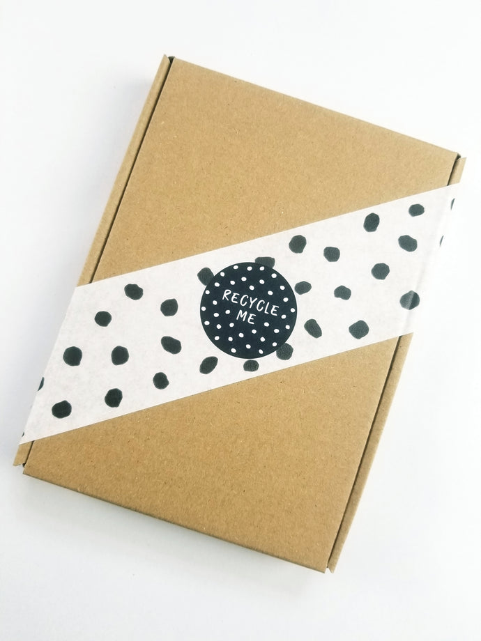 'Recycle Me' spotty stickers made from 100% recycled paper.