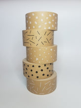 Load image into Gallery viewer, Pack of 12 eco-friendly patterned packaging tapes.
