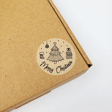Load image into Gallery viewer, &#39;Merry Christmas&#39; stickers with Christmas scene design made from Kraft brown paper
