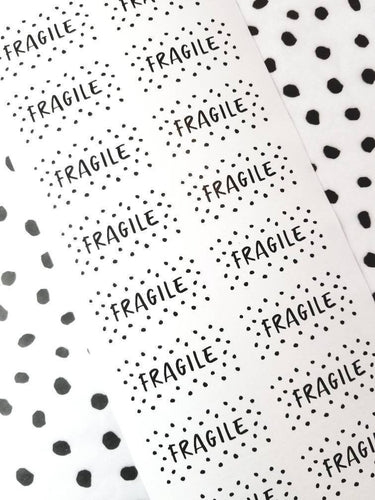 fragile sticker spotty